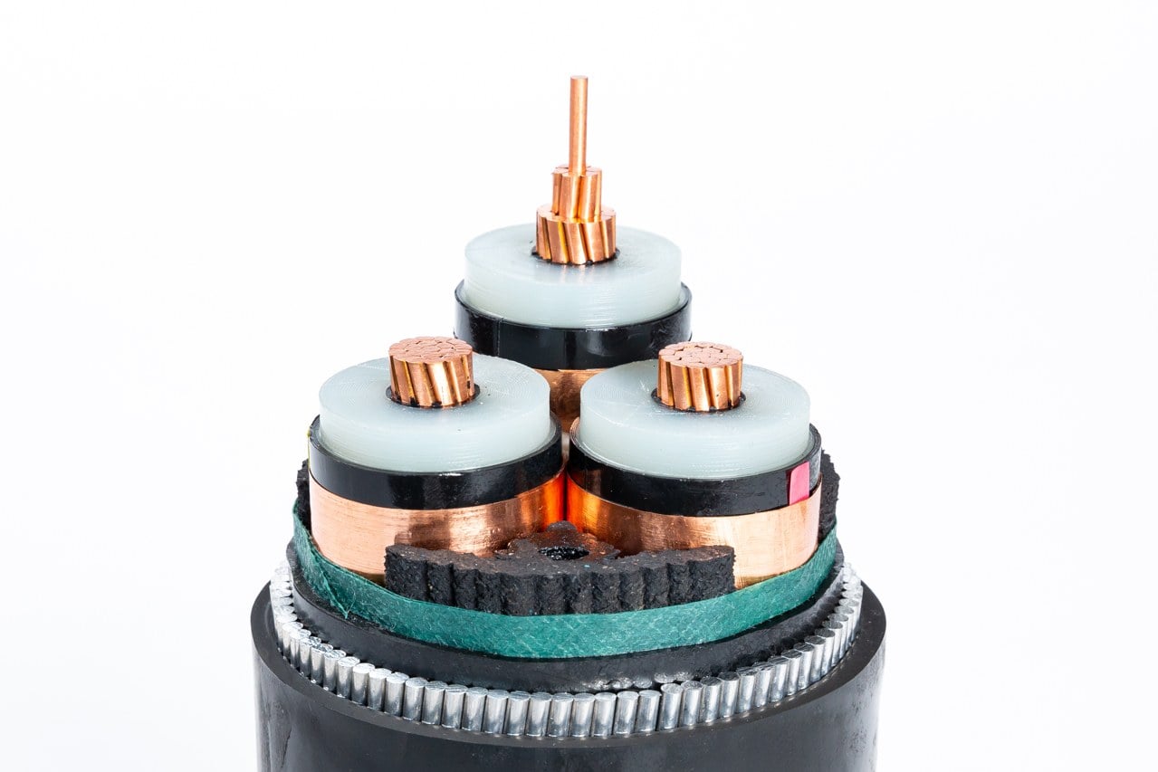 Prepared armoured cable sample with exposed copper conductors and protective layers
